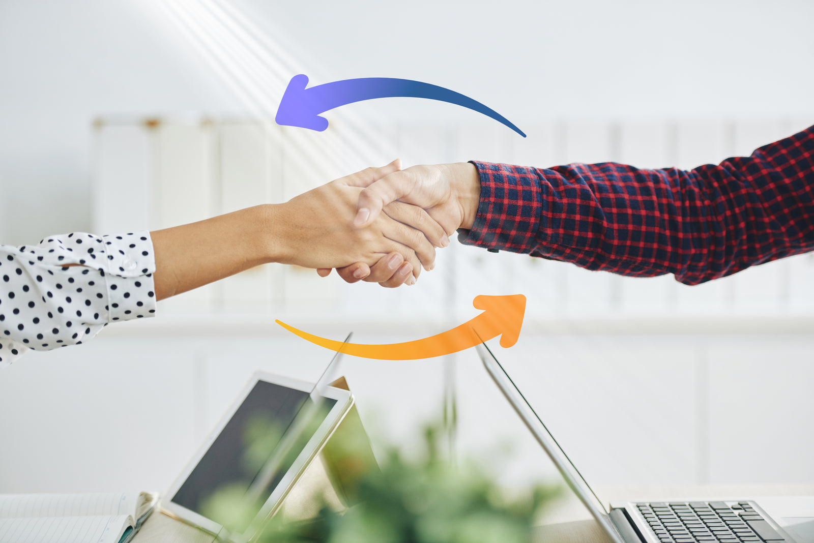 Sincerely Amazon Specialist shaking hands with client as Sincerely Amazon orange and purple arrows indicate teamwork